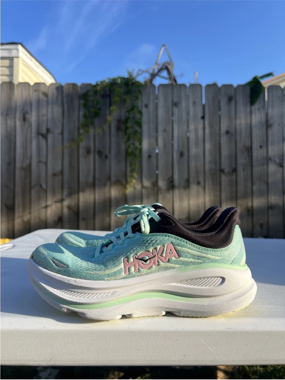 Women’s Hoka Bondi 9 Mint Green Athletic Trainer with Pink Logo size 7
